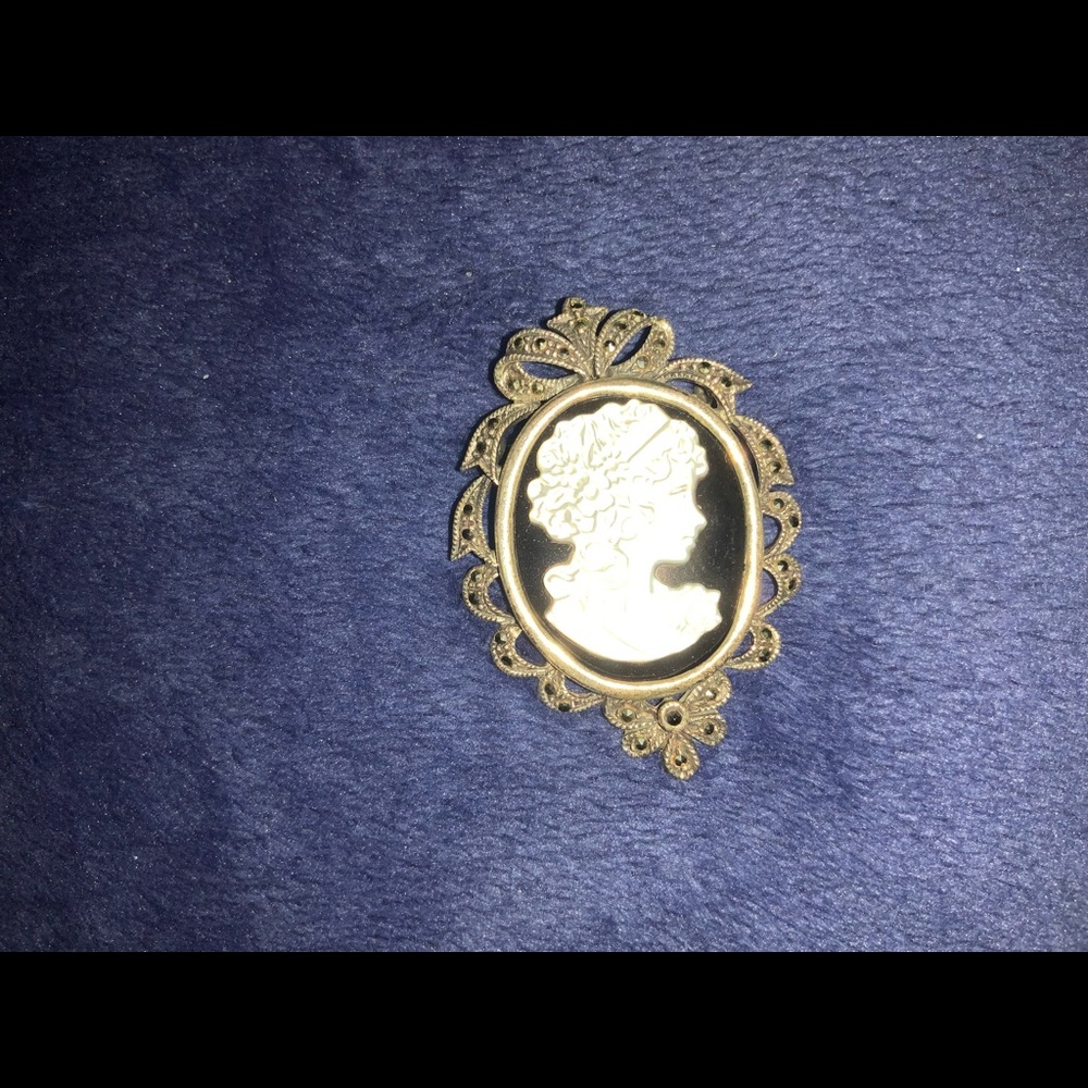 STERLING SILVER CAMEO. 1 1/2in by 2in.